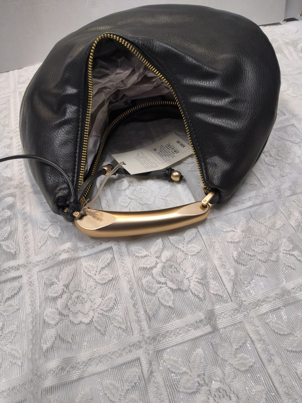 A New Day Crescent Handle Bag in Black with Gold Accent